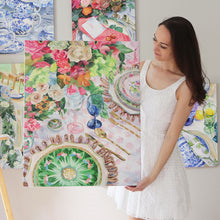 Load image into Gallery viewer, Elizabeth Alice Studio original acrylic painting art, lush tablescape with famille rose chinoiserie plates, clear pink blue wine glasses, pink and green floral bouquet centerpiece. Colorful painting for dining room, unique art for dining room, add pop of color to neutral room. Chinoiserie art, original painting, expressive brush strokes, impressionist modern painting, unique art for dining room. Colorful art for traditional home. Artist holding original painting,