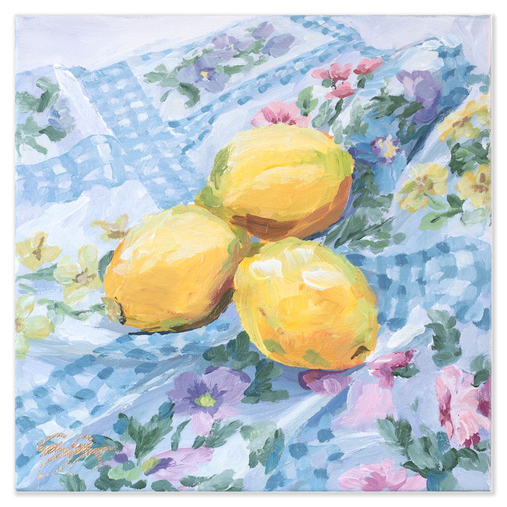 Lemons on floral fabric, a fine art print on paper