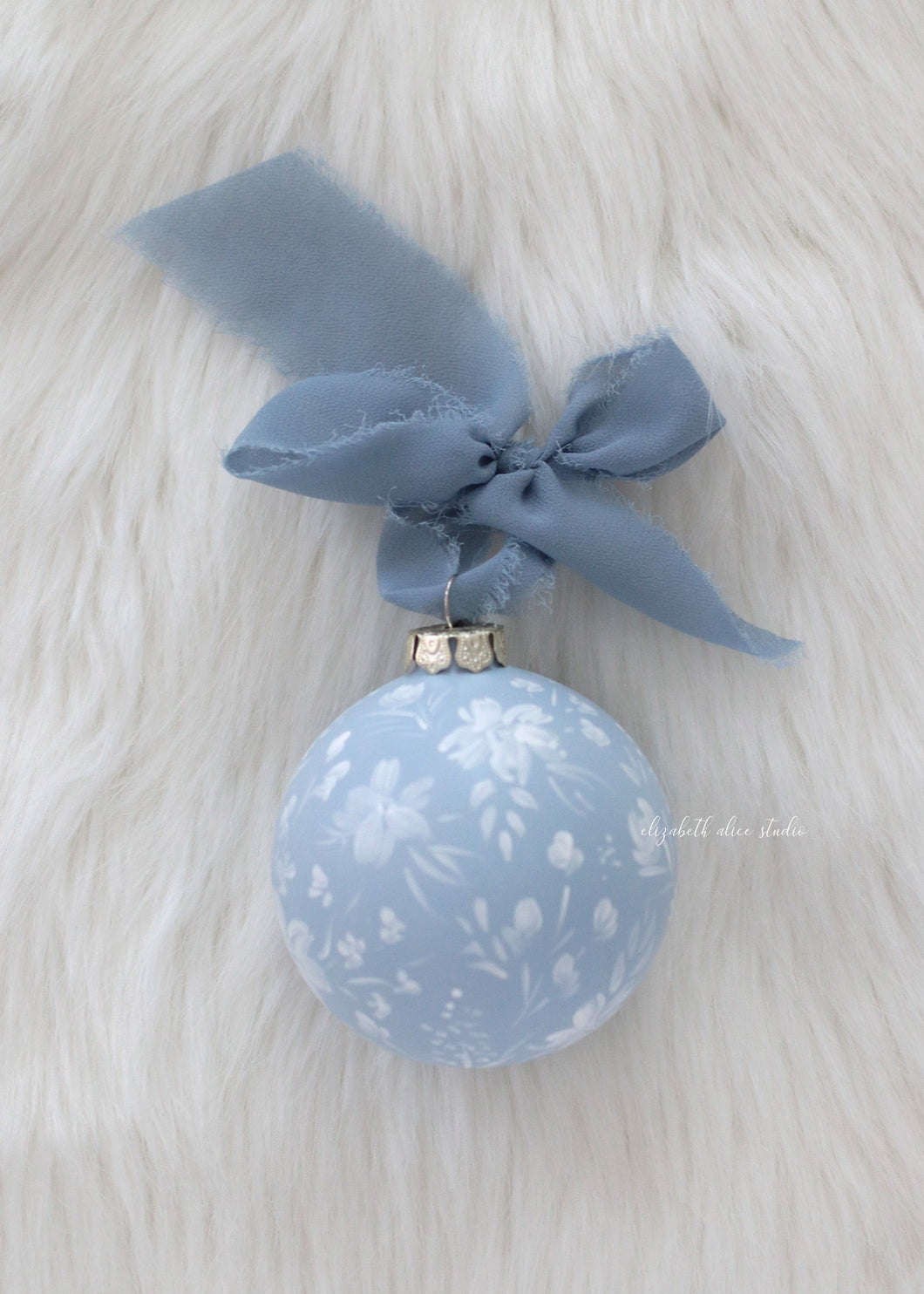 Blue floral hand-painted ornament