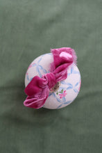 Load image into Gallery viewer, Ribbon trellis with fuchsia roses hand-painted, one of a kind ornament
