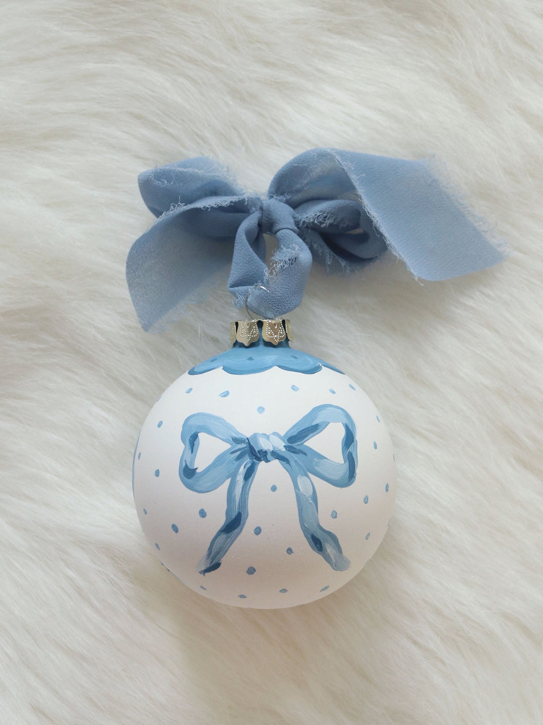 Blue bow hand-painted ornament